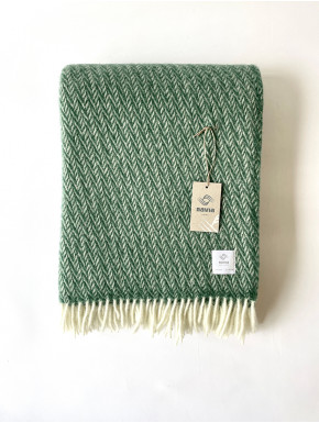 Grønt vævet tæppe